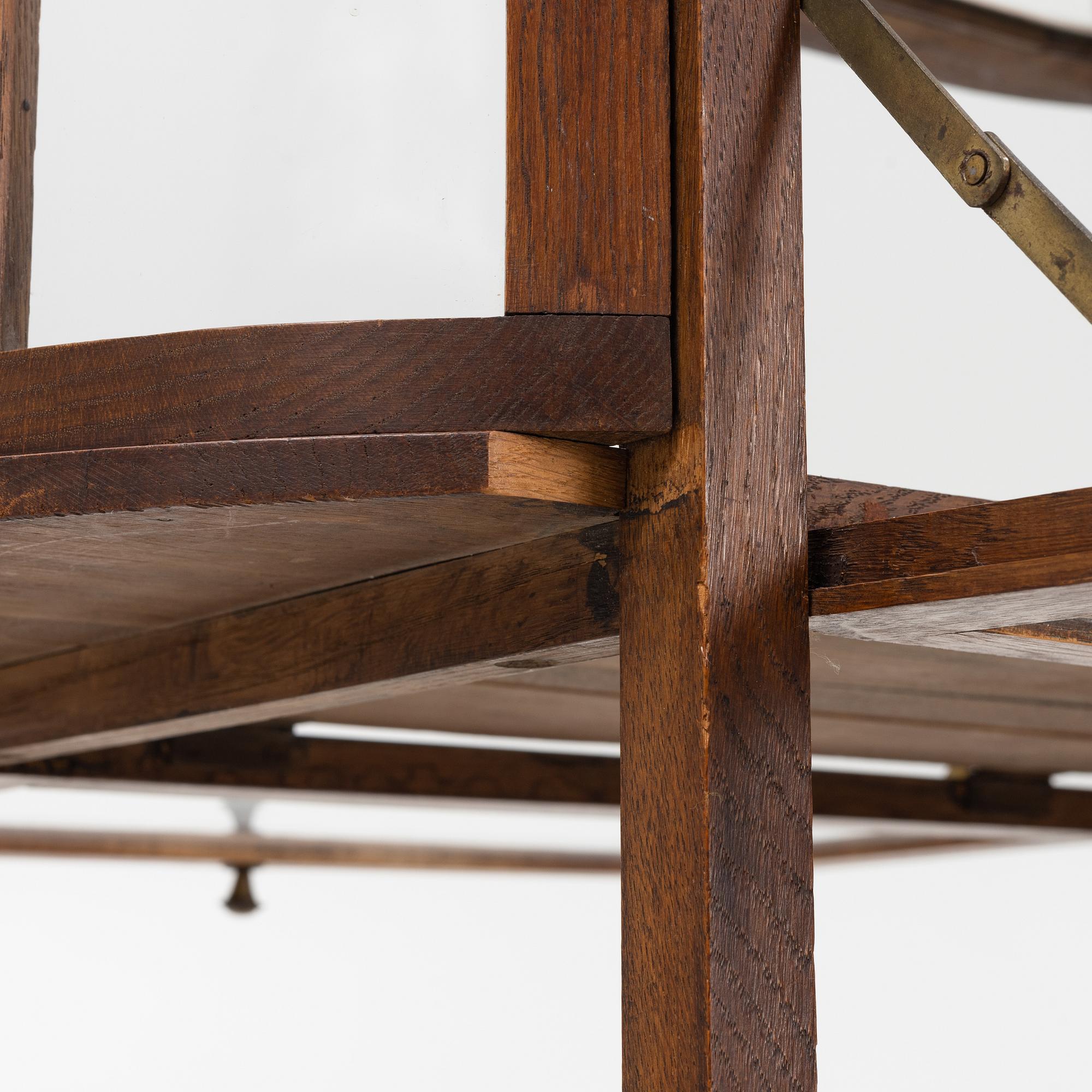 An oak tea trolley, early 20th Century.