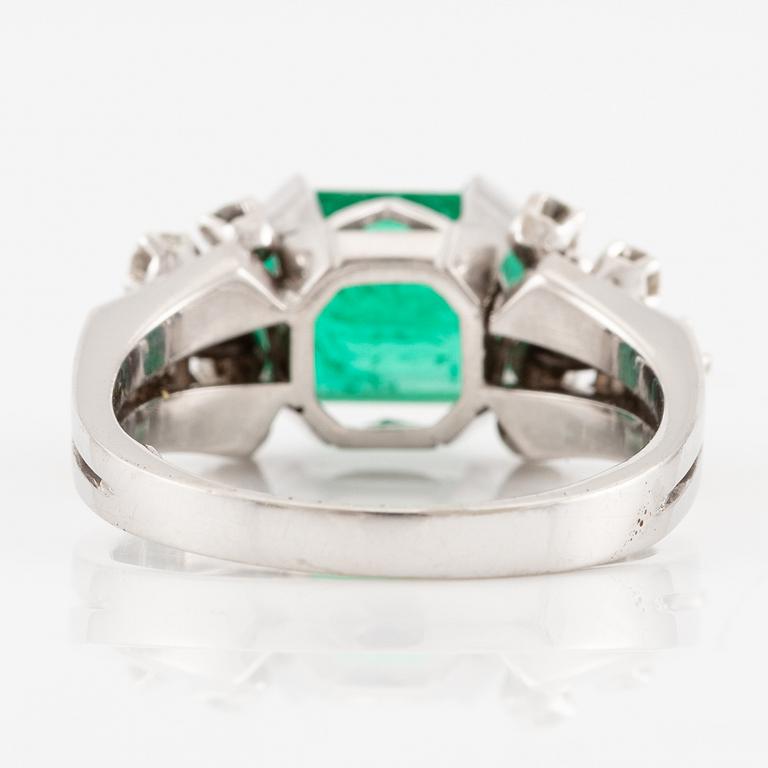 A W.A. Bolin ring 18K white gold with an emerald-cut emerald and brilliant-cut diamonds.