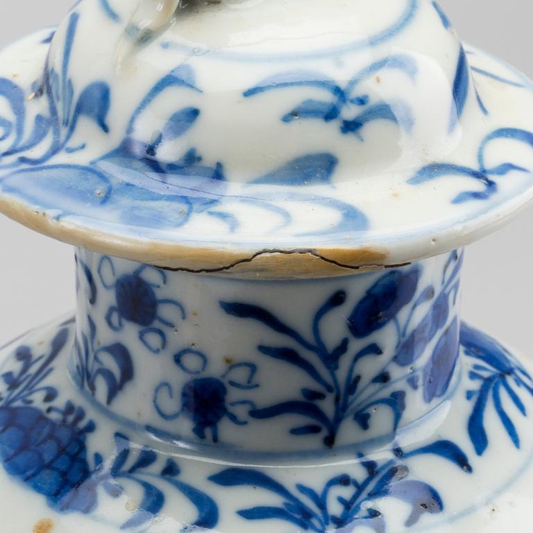 A set of three blue and white porcelain urns 19th century.