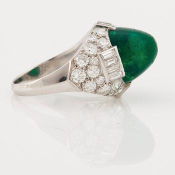 A cabochon-cut emerald, baguette, single and brilliant-cut diamond ring.