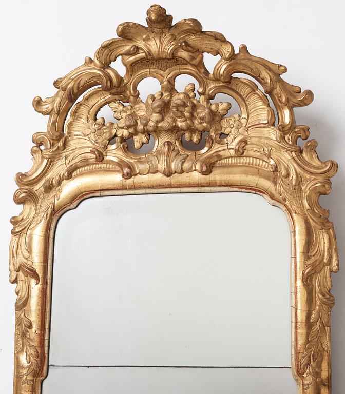 A Swedish Rococo mirror by Nils Sundström (master in Stockholm from 1757), dated 1770.