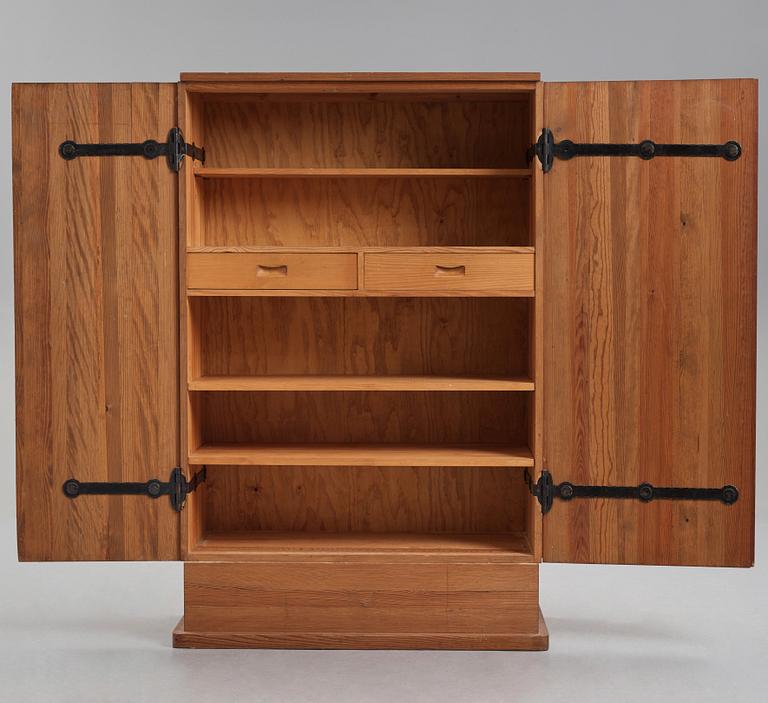 Axel Einar Hjorth, a "Lovö" stained pine cabinet, Nordiska Kompaniet, Sweden 1930's.