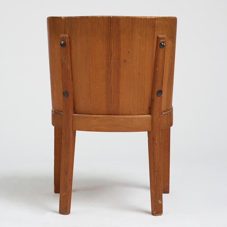 Axel Einar Hjorth, a stained pine low back "Lovö" chair, Nordiska Kompaniet, Sweden 1930's.