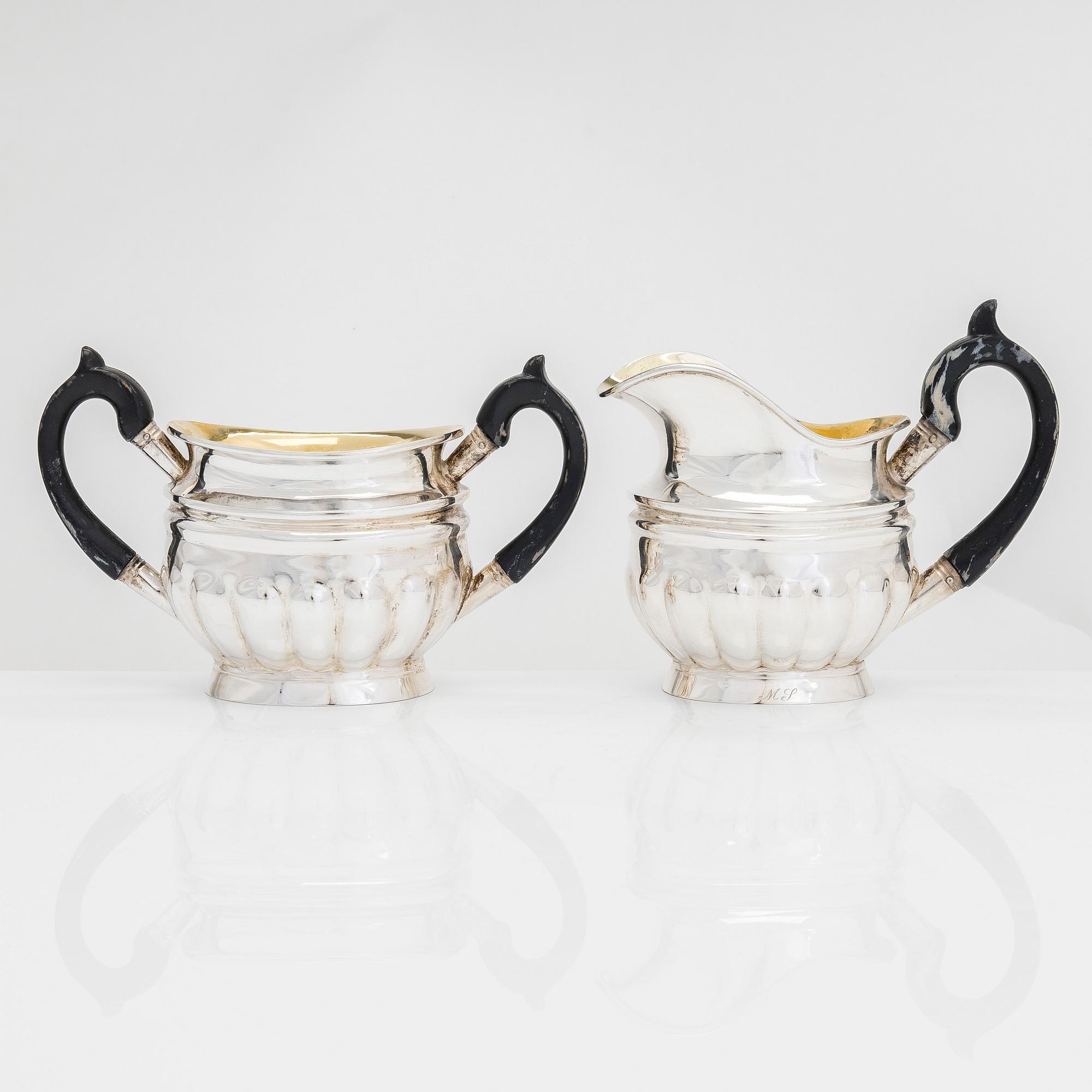 Sugar bowl and cream jug, and four pieces of silver cutlery, Vyborg, Turku, Hämeenlinna and Helsinki 1926-60.