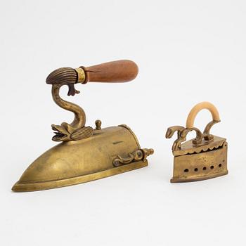 Two brass iron, early 19th century.