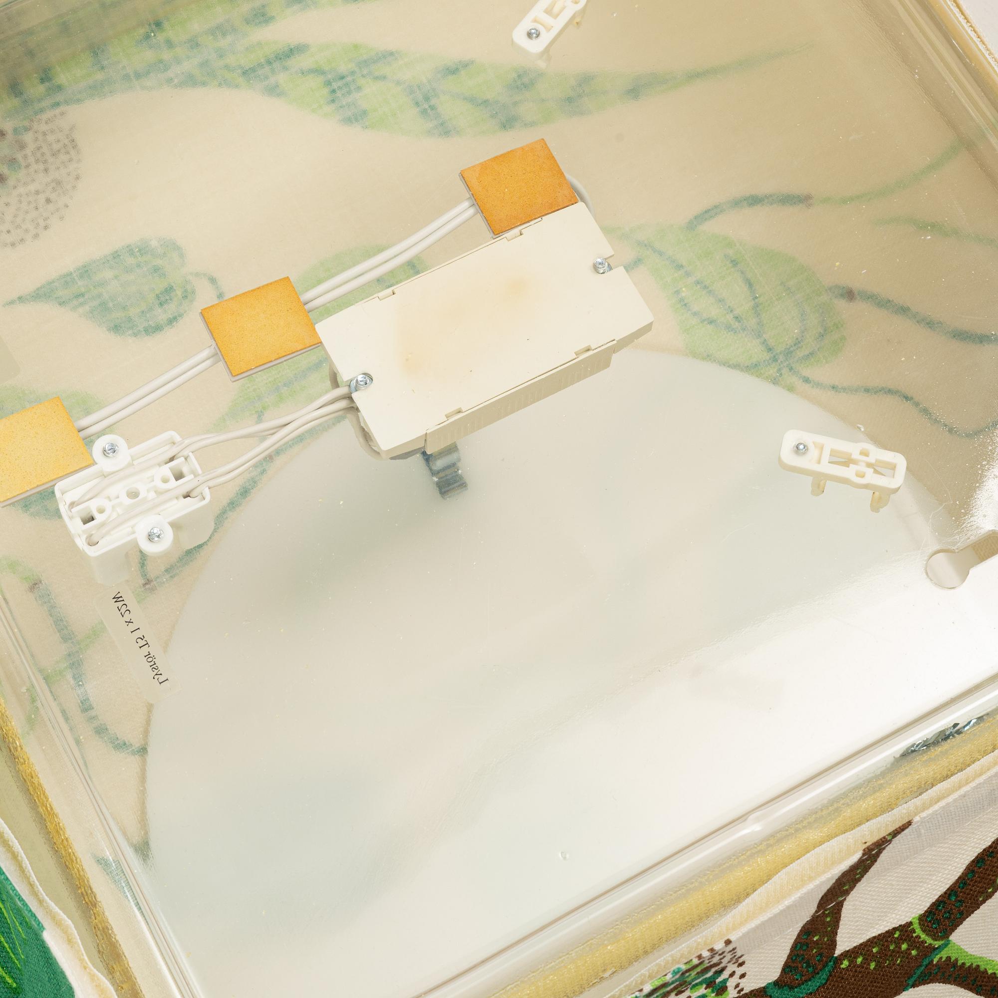 Firma Svenskt Tenn, David Taylor, an 'F-Air' wall lamp.