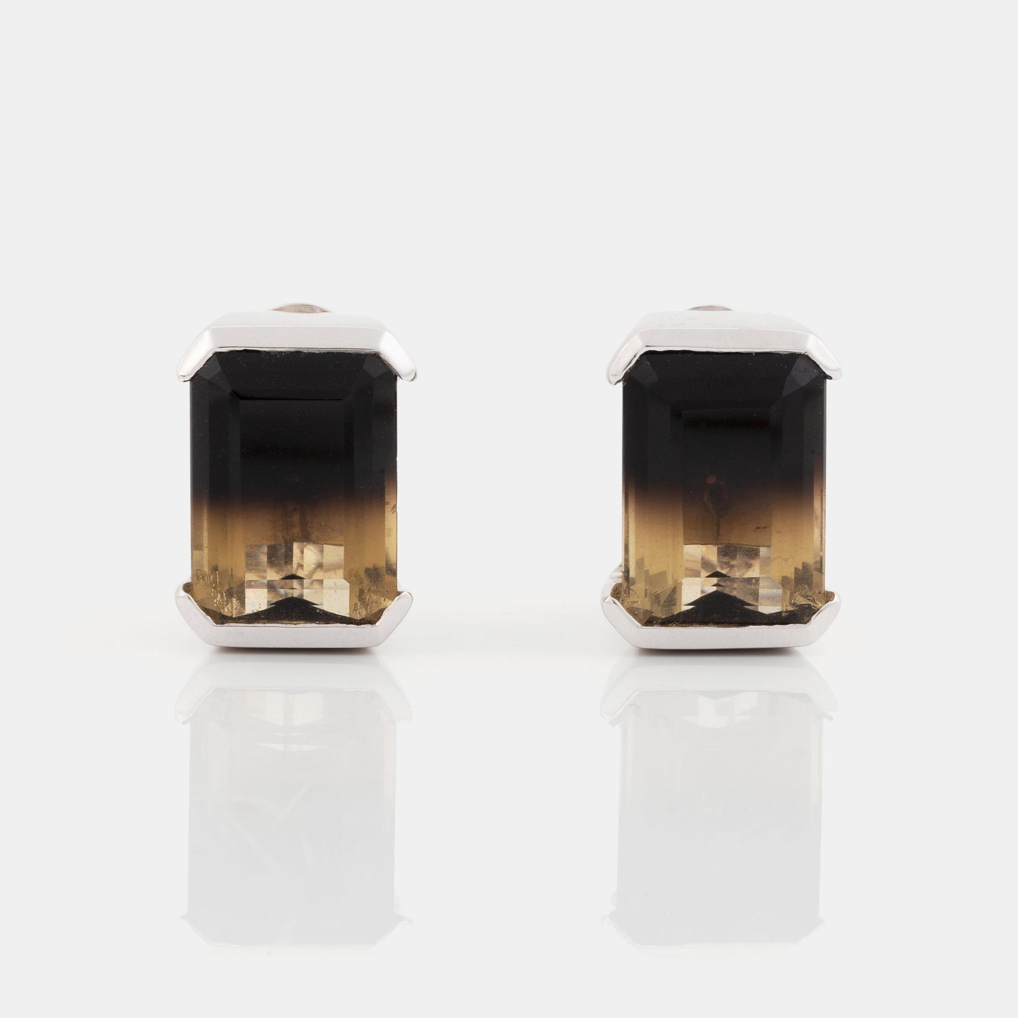 A pair of Tina Karlsson earrings in 18K white gold set with facted quartz.