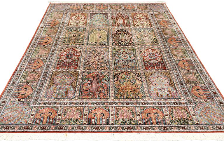 A silk Kashmir rug, c 247 x 161 cm.