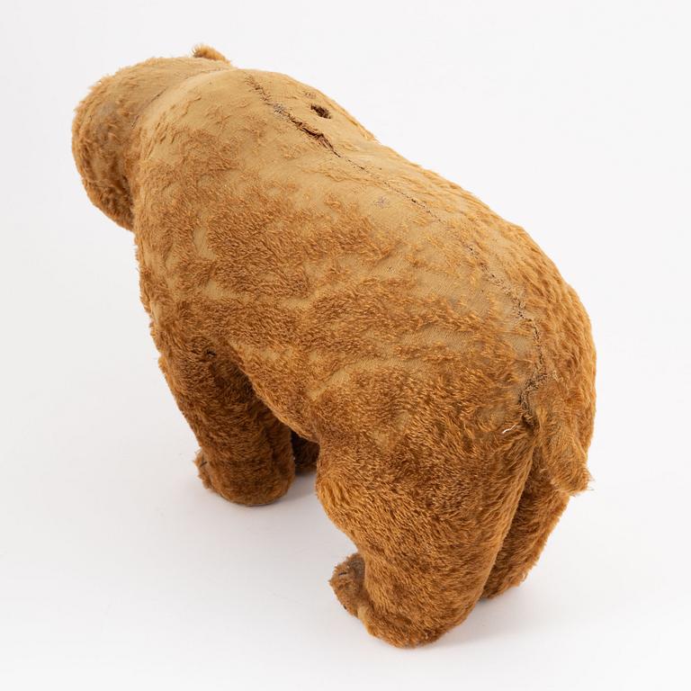 A toy bear, possibly Steiff, first half  of the  20th century.