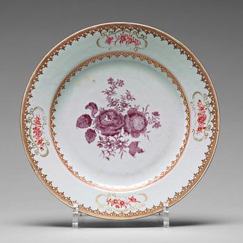 795. A set of 11 famille rose dinner plates, Qing dynasty, Qianlong (1736-95).