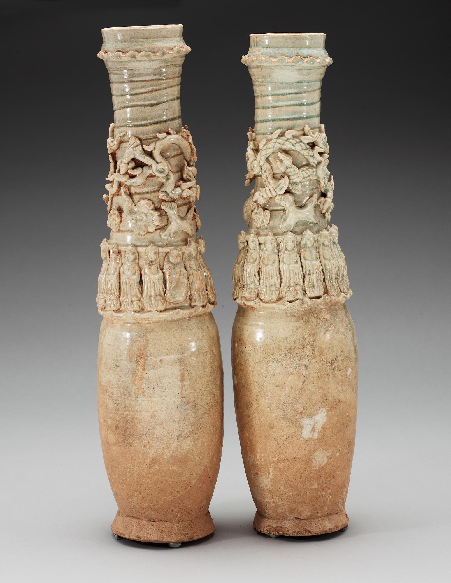 A set of two green glazed vases with covers, Yuan dynasty (1271-1368).