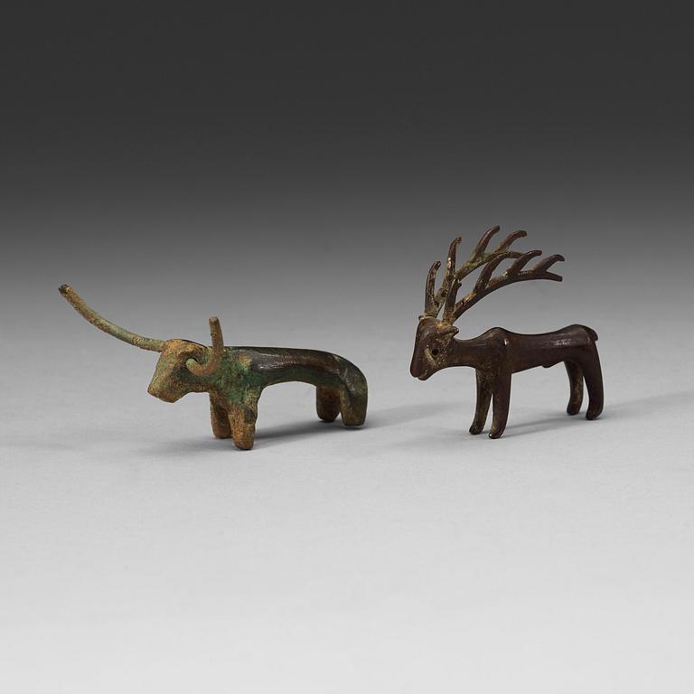 Two bronze figures in the shape of a bull and a stag, presumably Scythian, about 700 B.C. - 200 A.D.