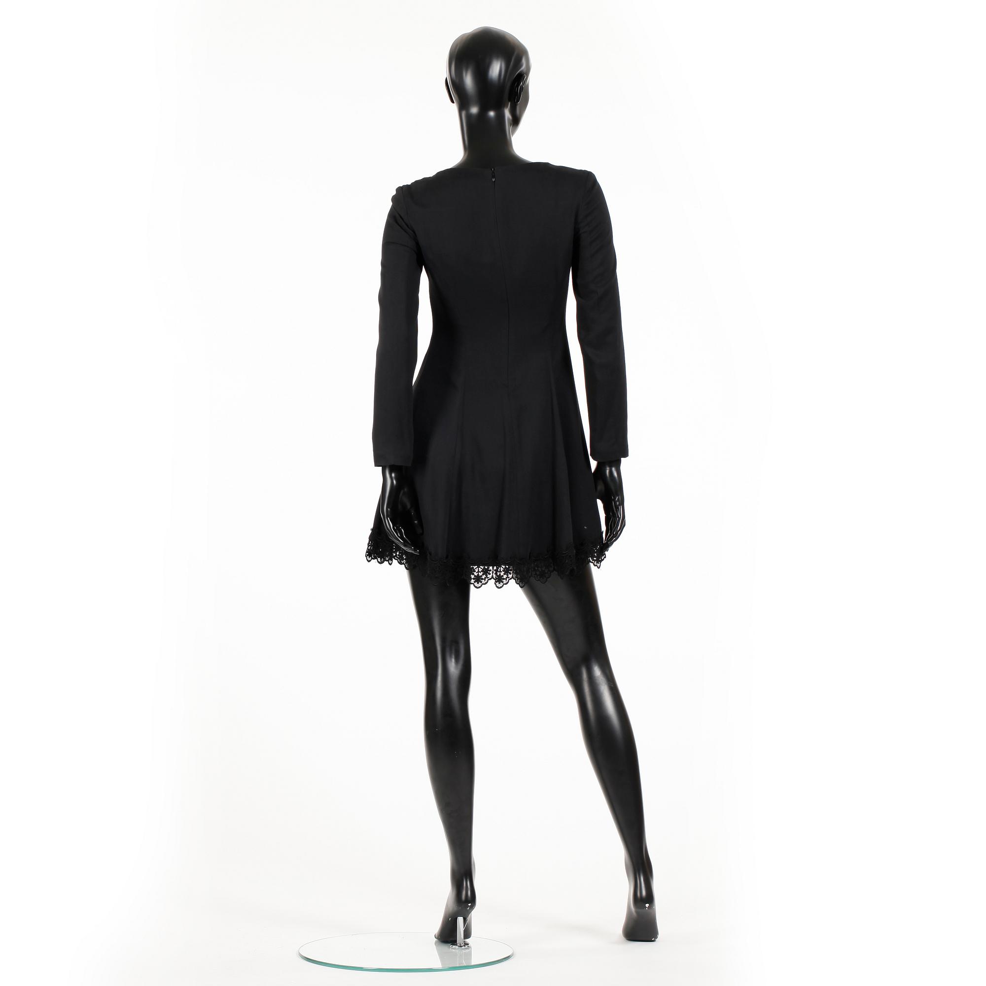 VERSACE, a black dress with lace.