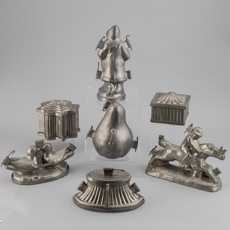 Choklad- eller dessertformar, 7 st, tenn, 1900-tal.