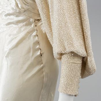 A satin wedding dress, circa 1935.