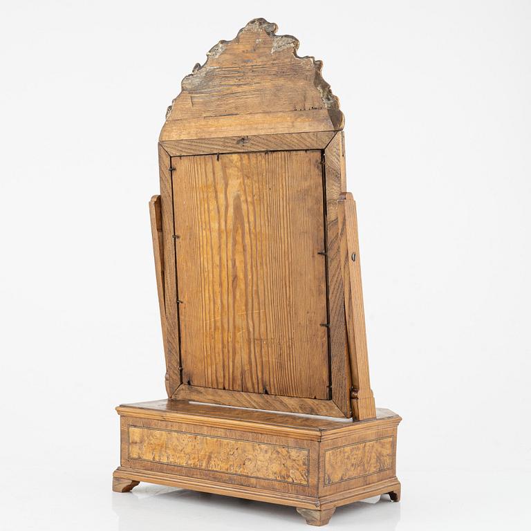 A Gustavian mirror, signed 'Fecit Olof Hallden d 1 junü 1791'.