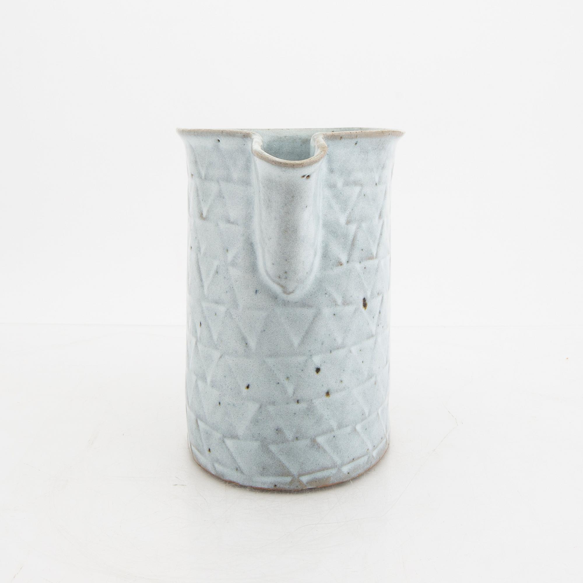 Signe Persson-Melin, a glazed ceramic pitcher, signed by hand.