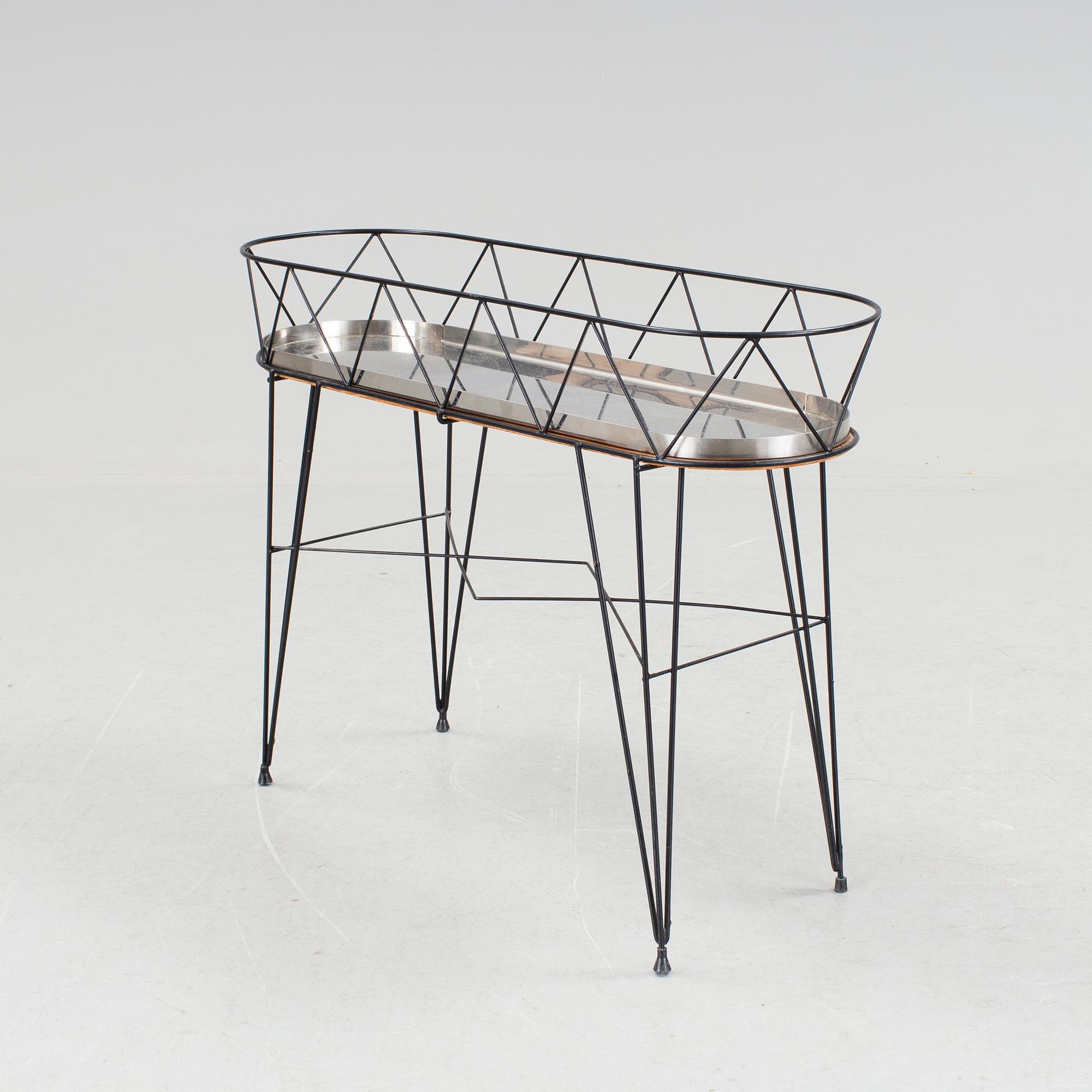 BLOMBORD, 1900-talets mitt.