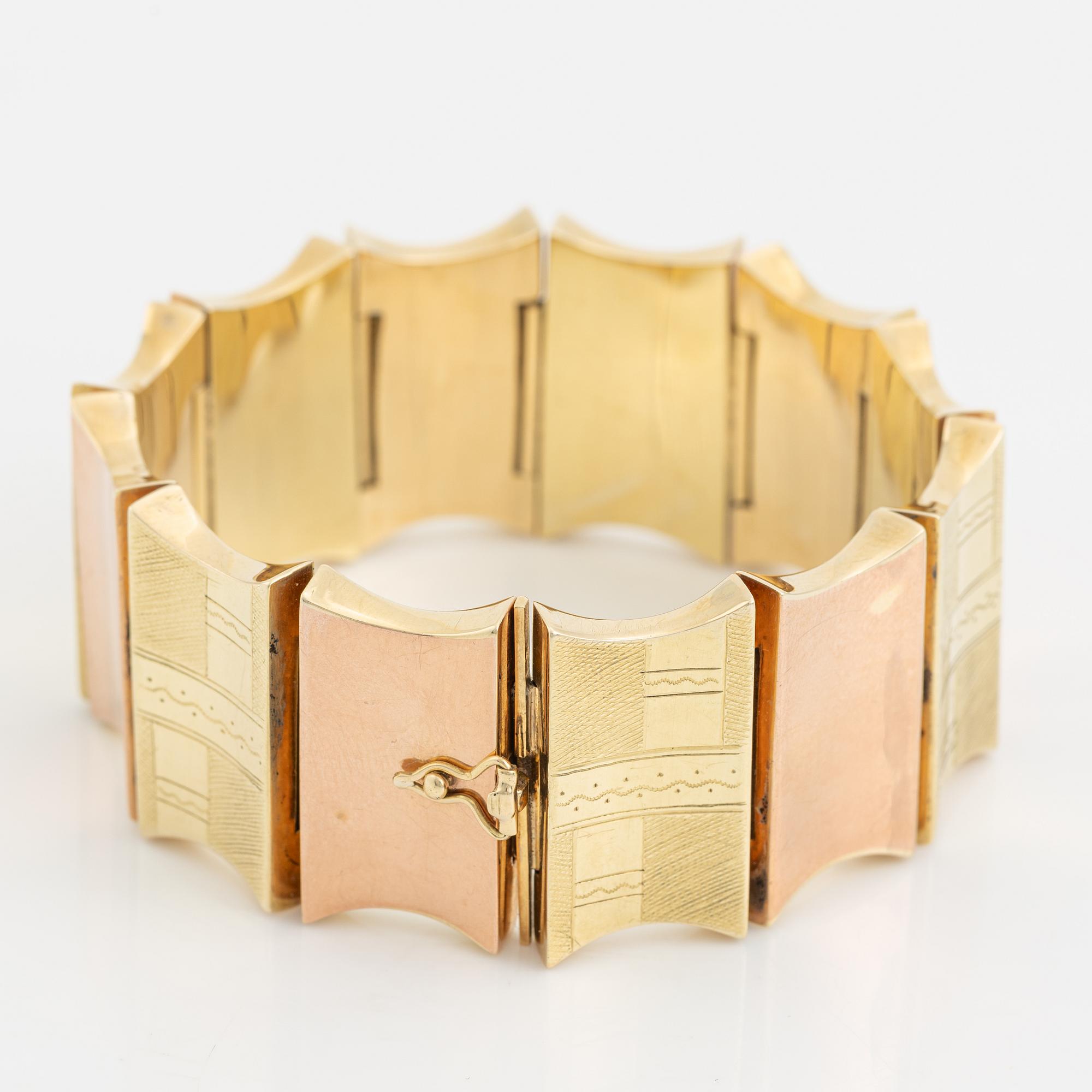 A 14K gold bracelet.