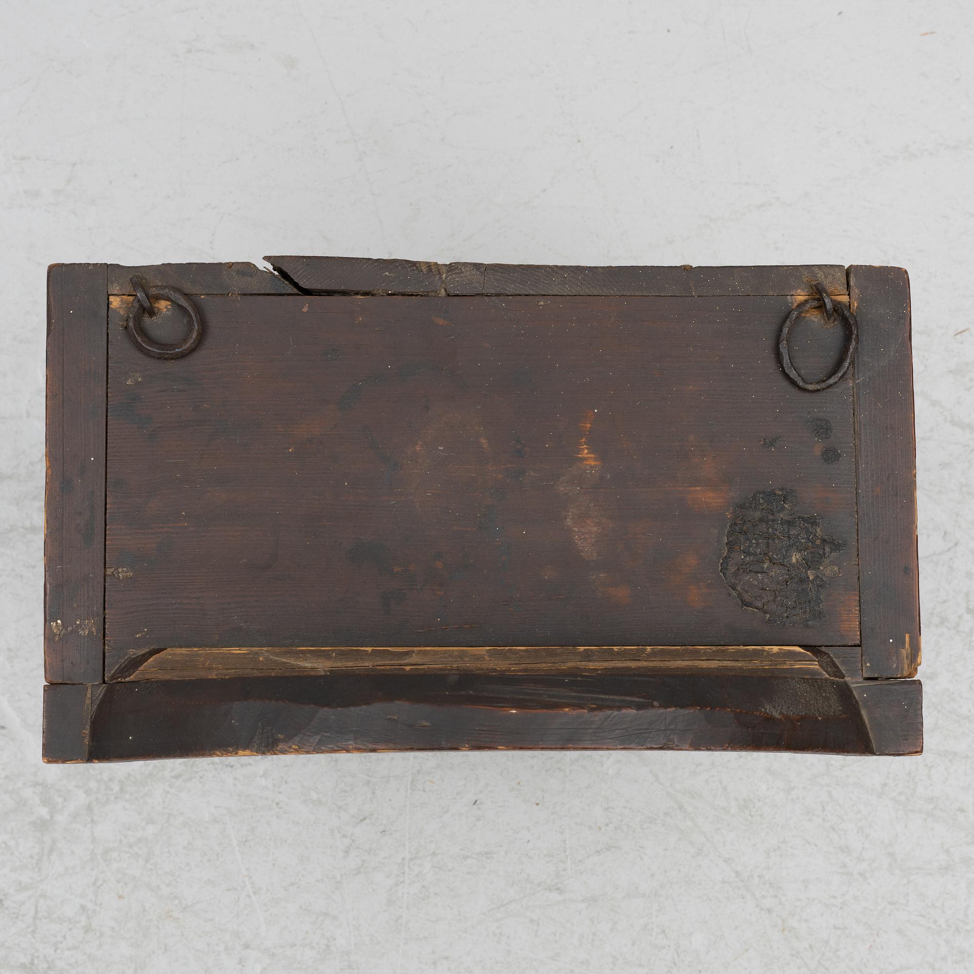 A hanging cabinet, dated 1870.