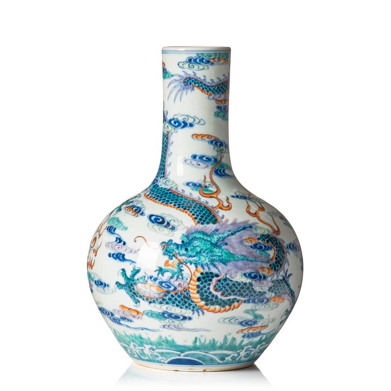 A doucai 'dragon and phoenix' vase, late Qing dynasty with Qianlong mark.