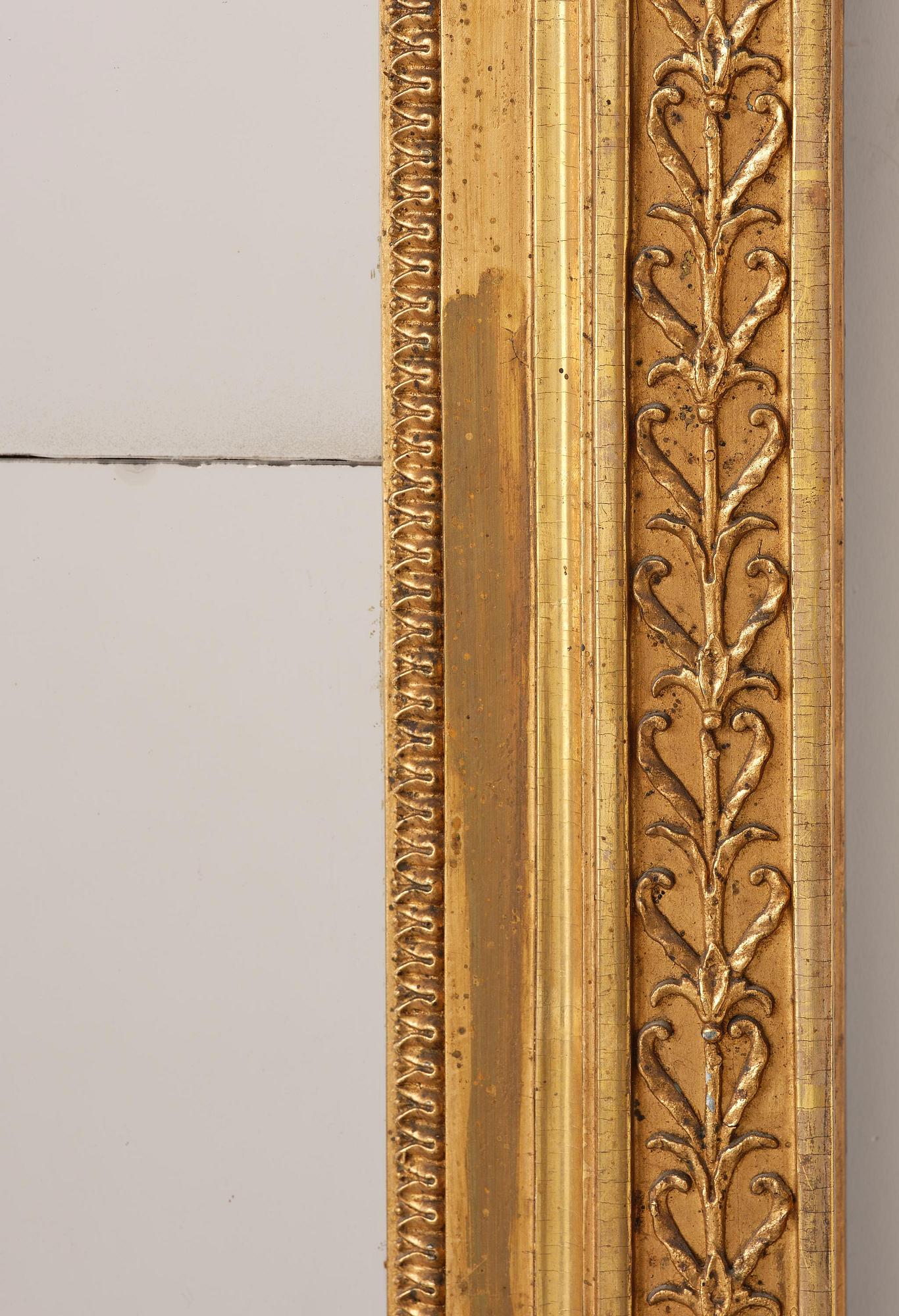 A late Gustavian giltwood mirror, Stockolm circa 1800.