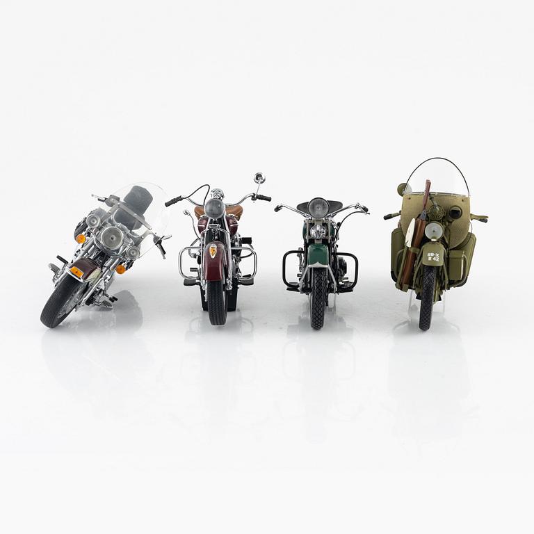 Four die cast model cars and four die cast model motor bikes, Franklin Mint.