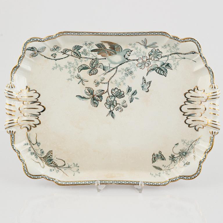 A 124-piece creamware dinner service, "Wexiö guld", Gustavsberg, Sweden, around 1900.