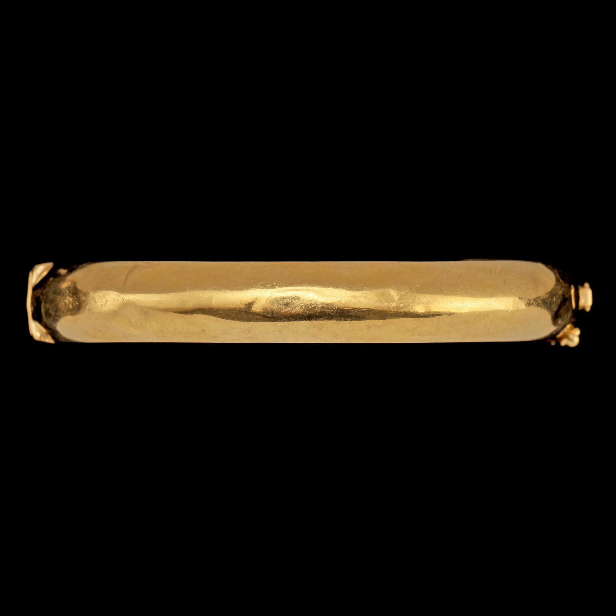 ARMRING, guld, 18k, stmpl B&H, 1961. Vikt 14 g.