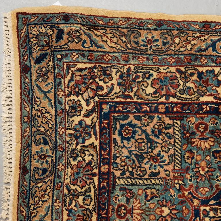 A CARPET. An old Kerman. 521 x 356 cm.