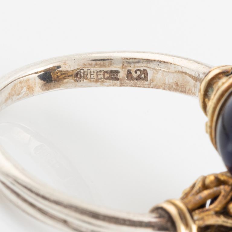 An Ilias Lalaounis ring in silver and 18K gold with sodalite.