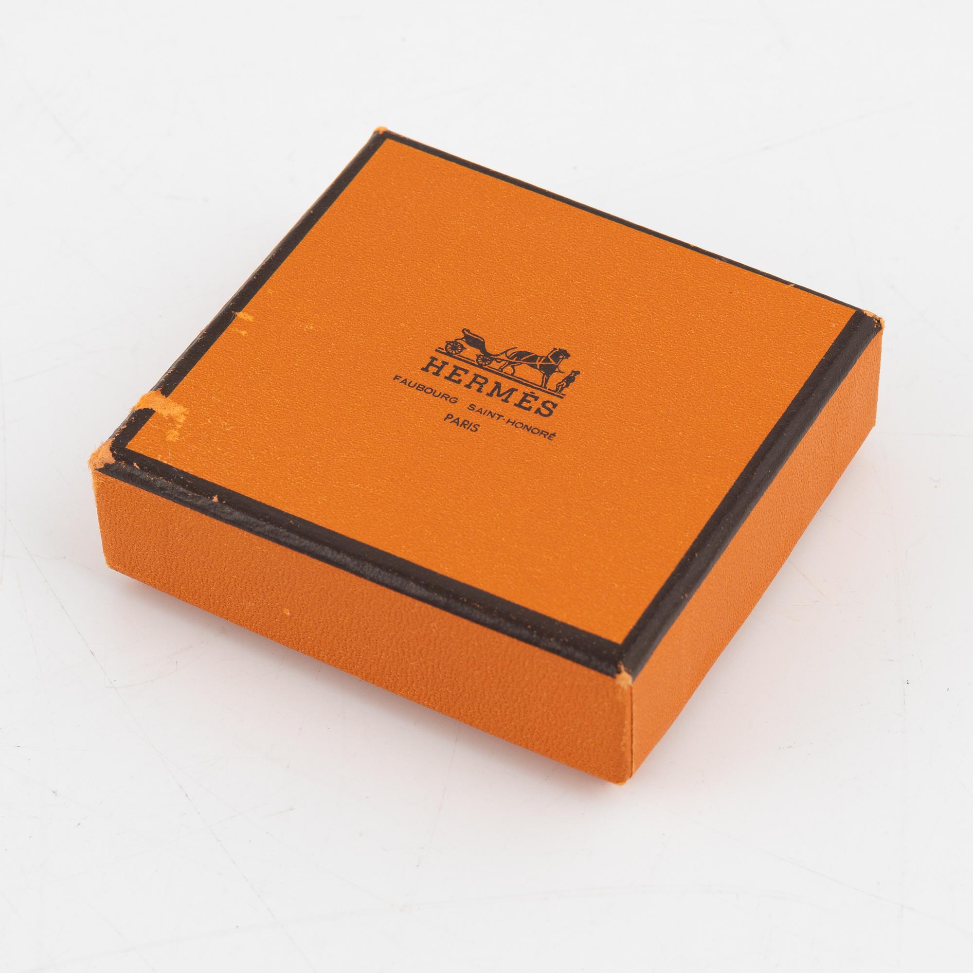 Hermès, a black leather 'Behapi' bracelet.