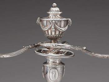 A pair of English 18th century silver candelabras, marks of Henry Hobdell, London 1778.