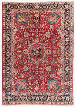 A semi-antique Tabriz carpet, c 358 x 248 cm.