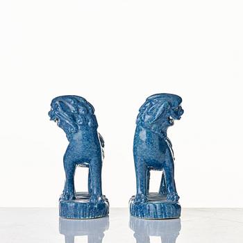 A pair of robbins egg glazed buddhist lions, Qing dynasty, 19th Century.