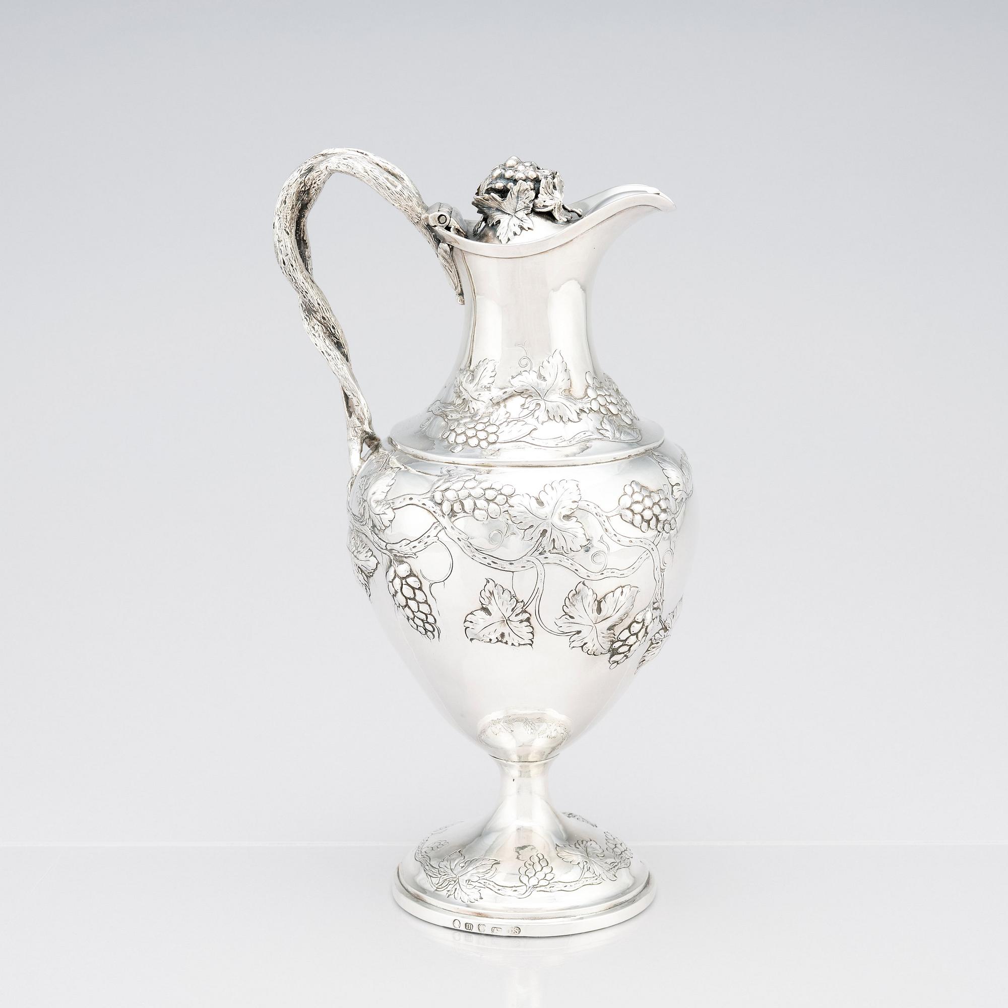 A George III sterling silver ewer, marks of John Scofield, London 1787.