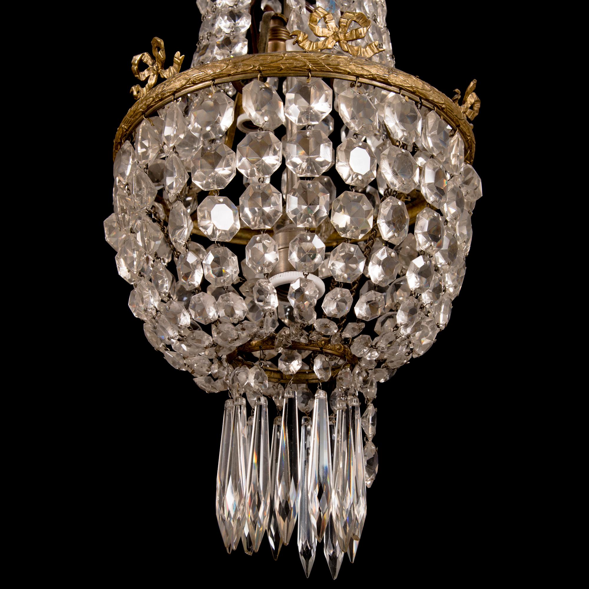 An early 20th century cut glass chandelier.