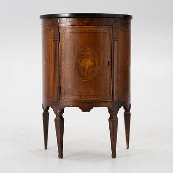 A small cabinet with drawers from around the year 1900.