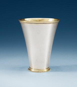 916. A Swedish 18th century parcel-gilt beaker, makers mark of Jacob Brunck, Stockholm 1721.