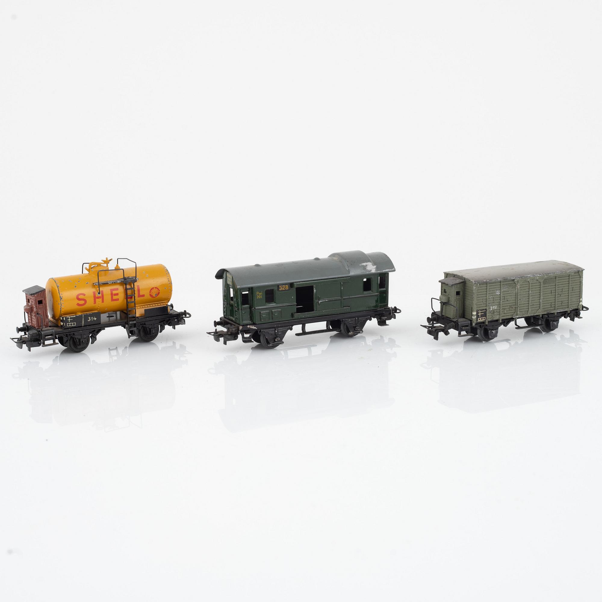 Märklin, two electric locomotives, model 3528 and 3338, and six cargo cars, gauge H0.