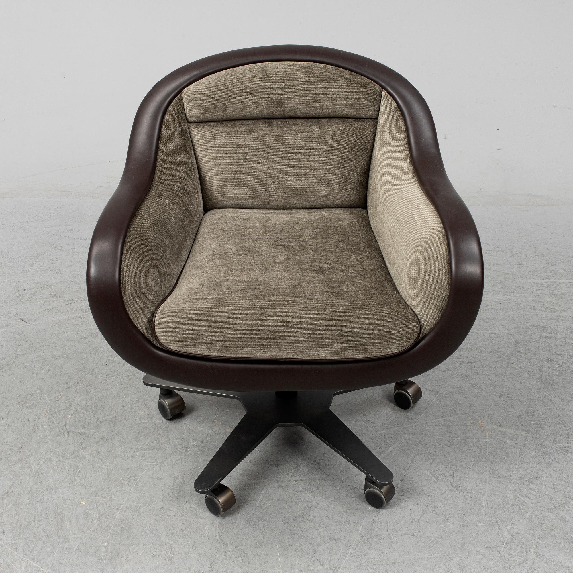 An contemporary 'Vittoria' office chair by Romeo Sozzi for Promemoria furniture.