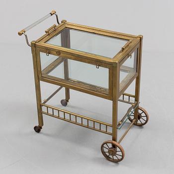 A early brass serving trolley.