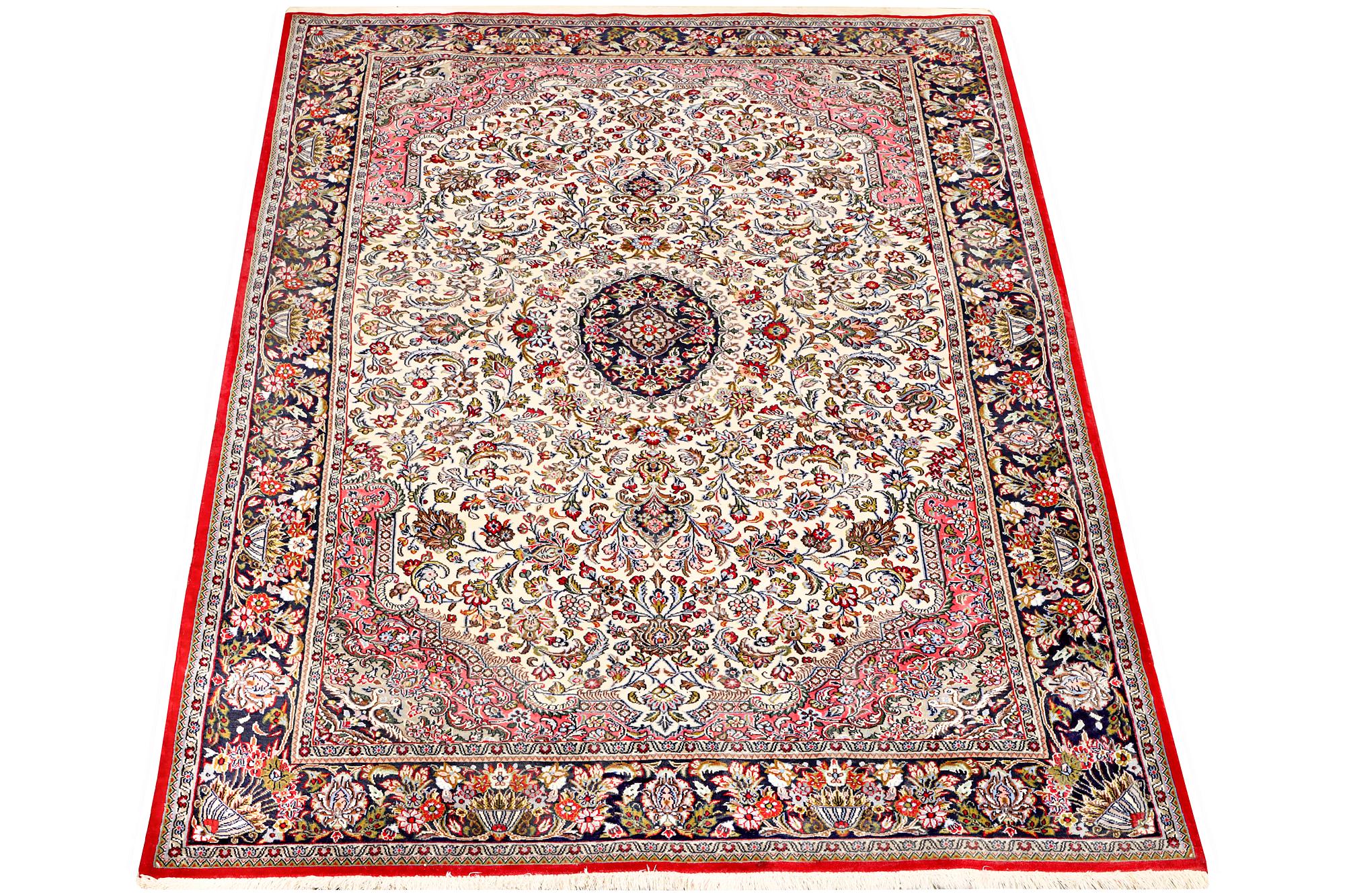 A Quum rug, c. 204 x 134 cm.