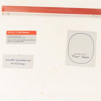 Arne Jacobsen, Bruno Mathsson & Piet Hein, a 'Super circle' dining table, Fritz Hansen, Denmark, 2007.