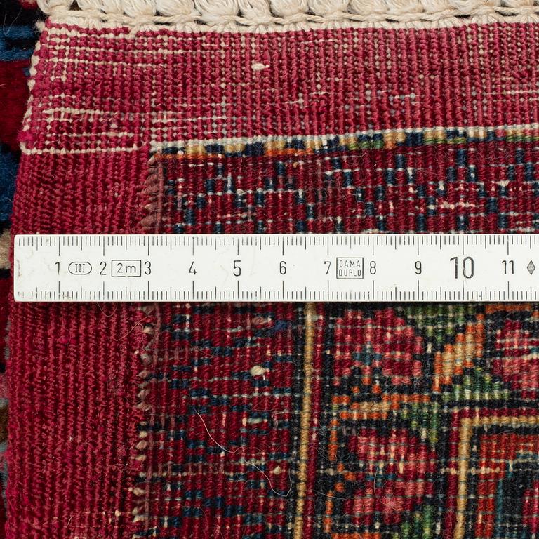 A semi-antique Mashad Saber carpet, north east Persia, ca 475 x 349 cm (including the flat weave).