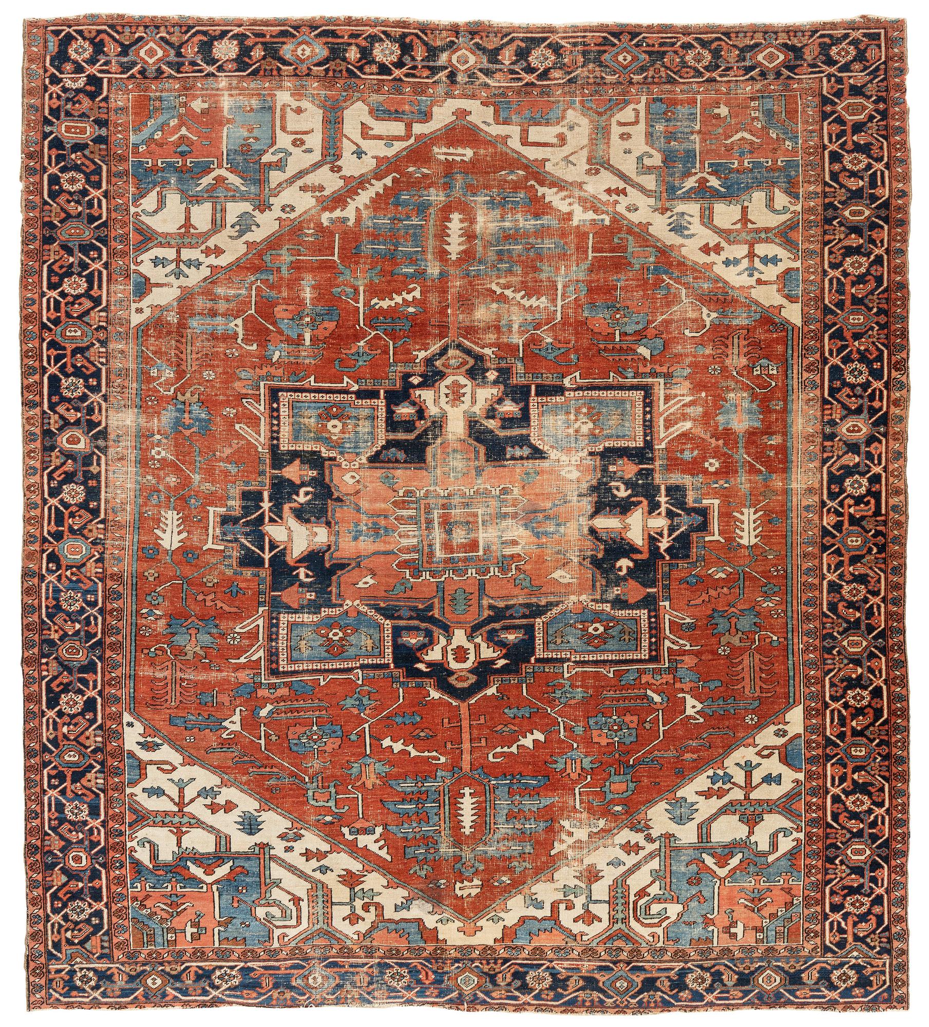 An antique Heriz carpet, ca 350 x 317 cm.
