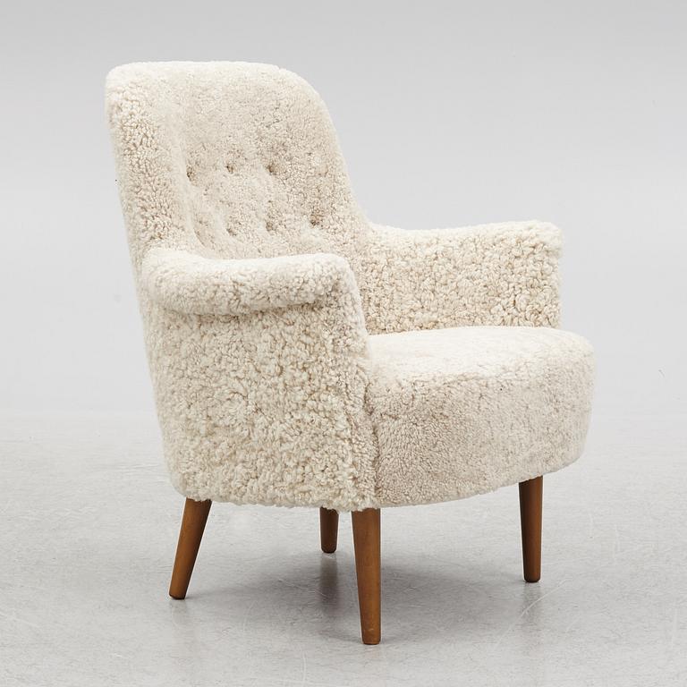 Carl Malmsten, a "Husmor" armchair, O.H.Sjögren, Tranås, 1984.