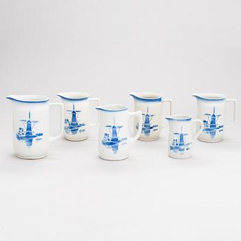 A set of six ceramic milk jugs by Arabia, Finland 1930s-40s.