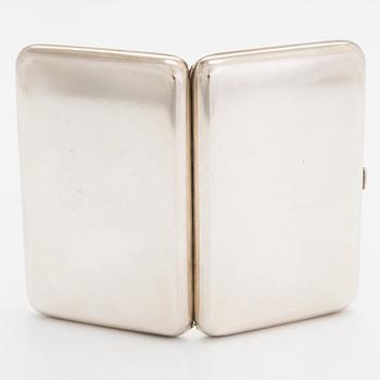 A silver cigarette case, Hlebnikov,  Imperial warrant, unidentified maker's mark, Moscow 1899-1908.