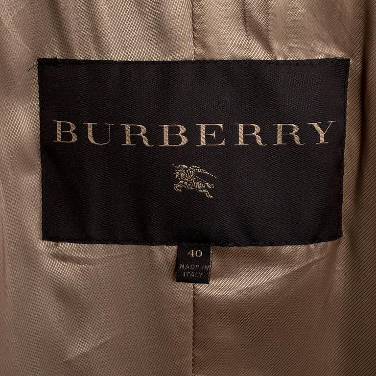 BURBERRY, a brown leather trenchcoat.